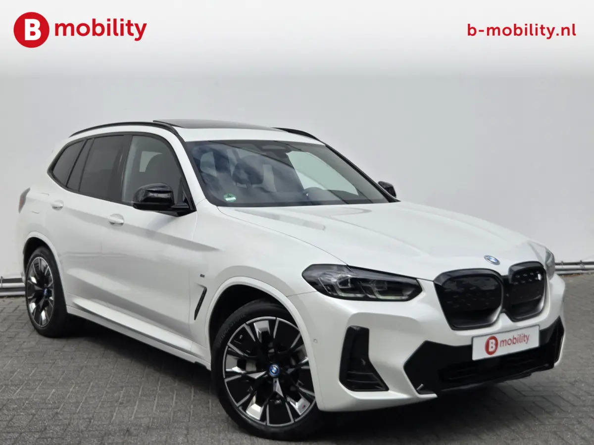 High Executive 80 kWh M-Sport 'Mineral-Weiss' Trekhaak Panoramadak | Head-Up | Harman/Kardon | Adaptive LED | ACC | DAB