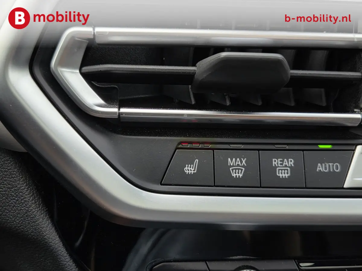 High Executive 80 kWh M-Sport 'Mineral-Weiss' Trekhaak Panoramadak | Head-Up | Harman/Kardon | Adaptive LED | ACC | DAB