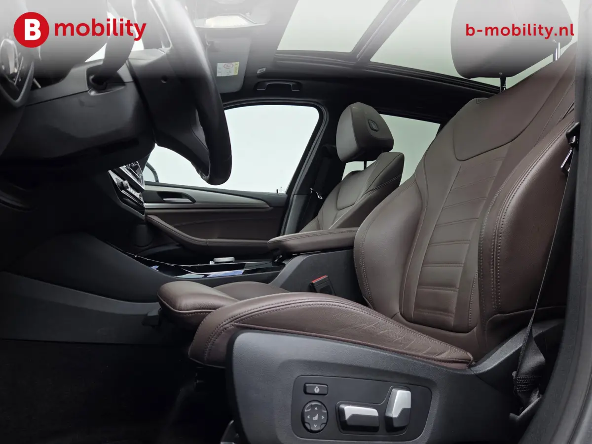 High Executive 80 kWh M-Sport 'Mineral-Weiss' Trekhaak Panoramadak | Head-Up | Harman/Kardon | Adaptive LED | ACC | DAB