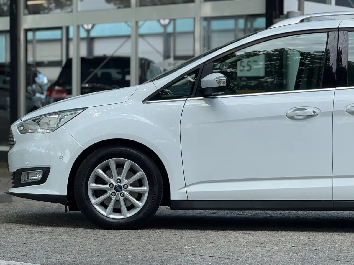 1.0 Titanium 7 zits PANO Leer Facelift Vol Dealer onderhouden