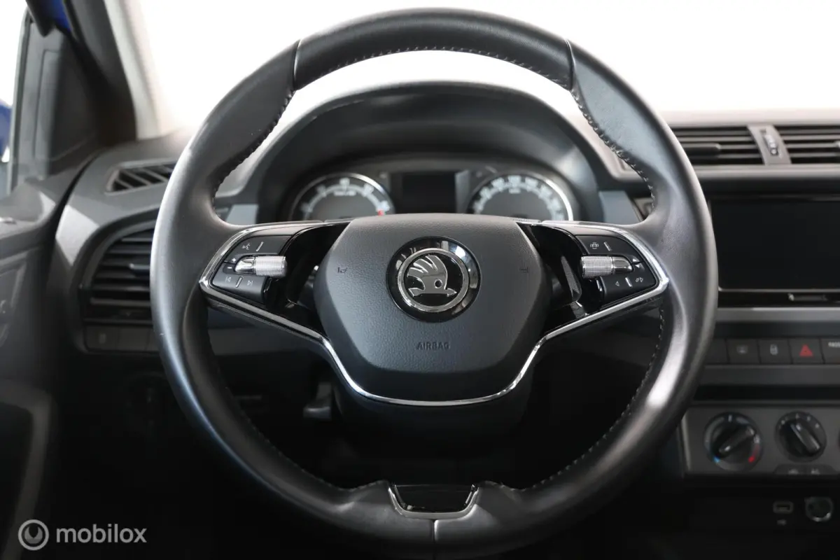 1.0 TSI Ambition - Cruise control - Bluetooth - Airco