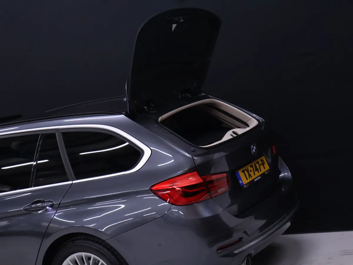 318i Luxury Edition [SCHUIFKANTELDAK, APPLE CARPLAY, MEMORY SEATS, STOELVERWARMING, 360 CAMERA, VOL LEDER, PDC V+A, NAVIGATIE PROFESSIONAL, CLIMATE, ELEKTRISCHE ACHTERKLEP, LED, KEYLESS STAR