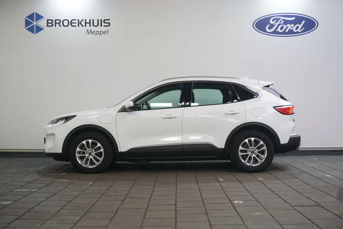 2.5 PHEV Titanium | Winter-pack | Camera | Apple carplay / andriod auto | Standkachel | Navigatie incl. bluetooth