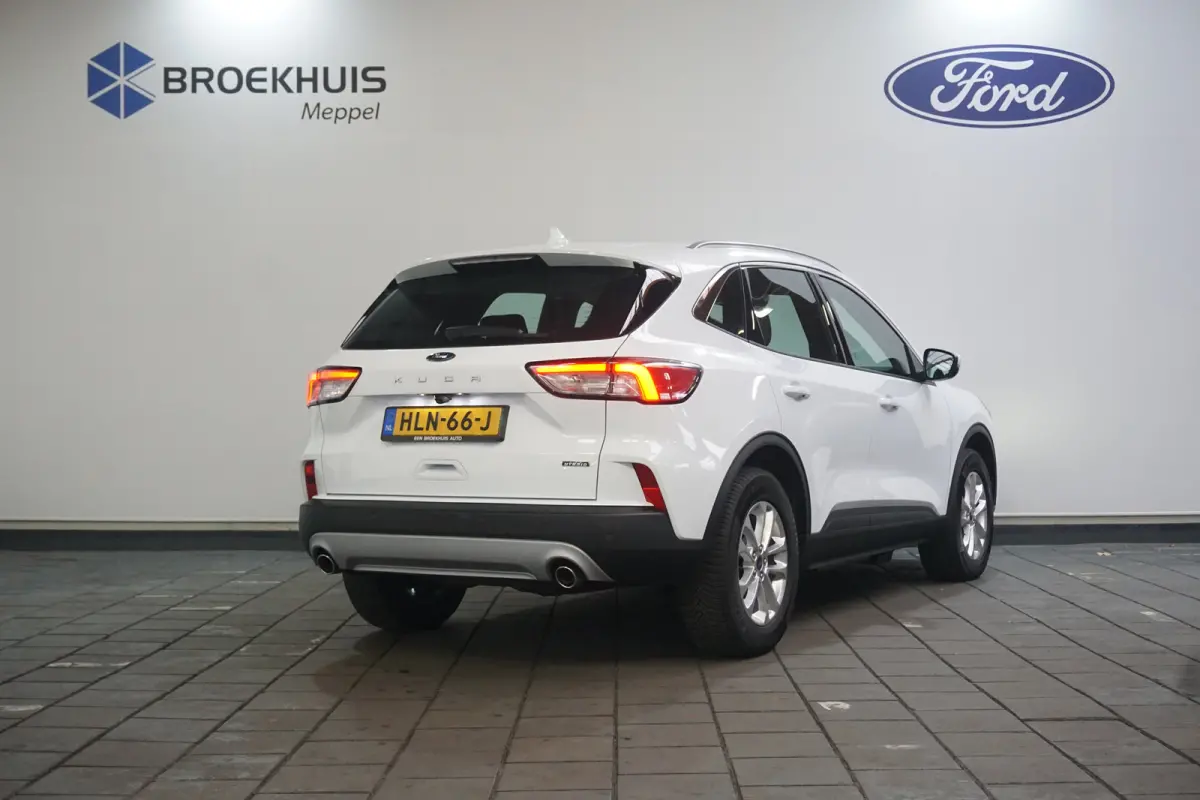 2.5 PHEV Titanium | Winter-pack | Camera | Apple carplay / andriod auto | Standkachel | Navigatie incl. bluetooth