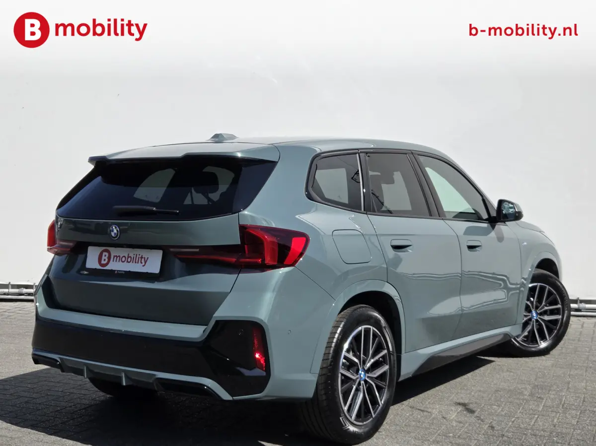eDrive20 67 kWh M-Sport SOH 99% Driving Assist. Plus | Sportstoelen | Park Assist | Leer | Adaptive Cruise Control | DAB | NL Auto! | Achteruitrijcamera