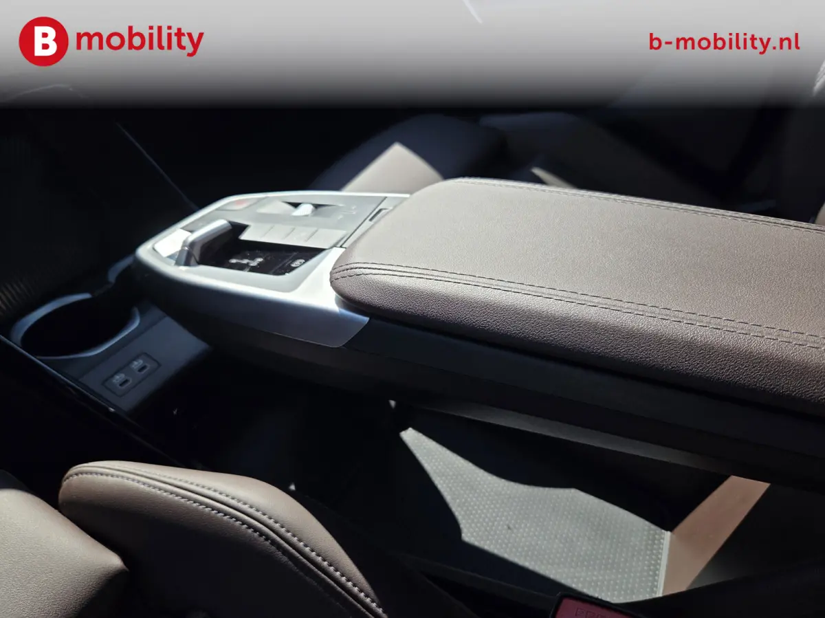 eDrive20 67 kWh M-Sport SOH 99% Driving Assist. Plus | Sportstoelen | Park Assist | Leer | Adaptive Cruise Control | DAB | NL Auto! | Achteruitrijcamera