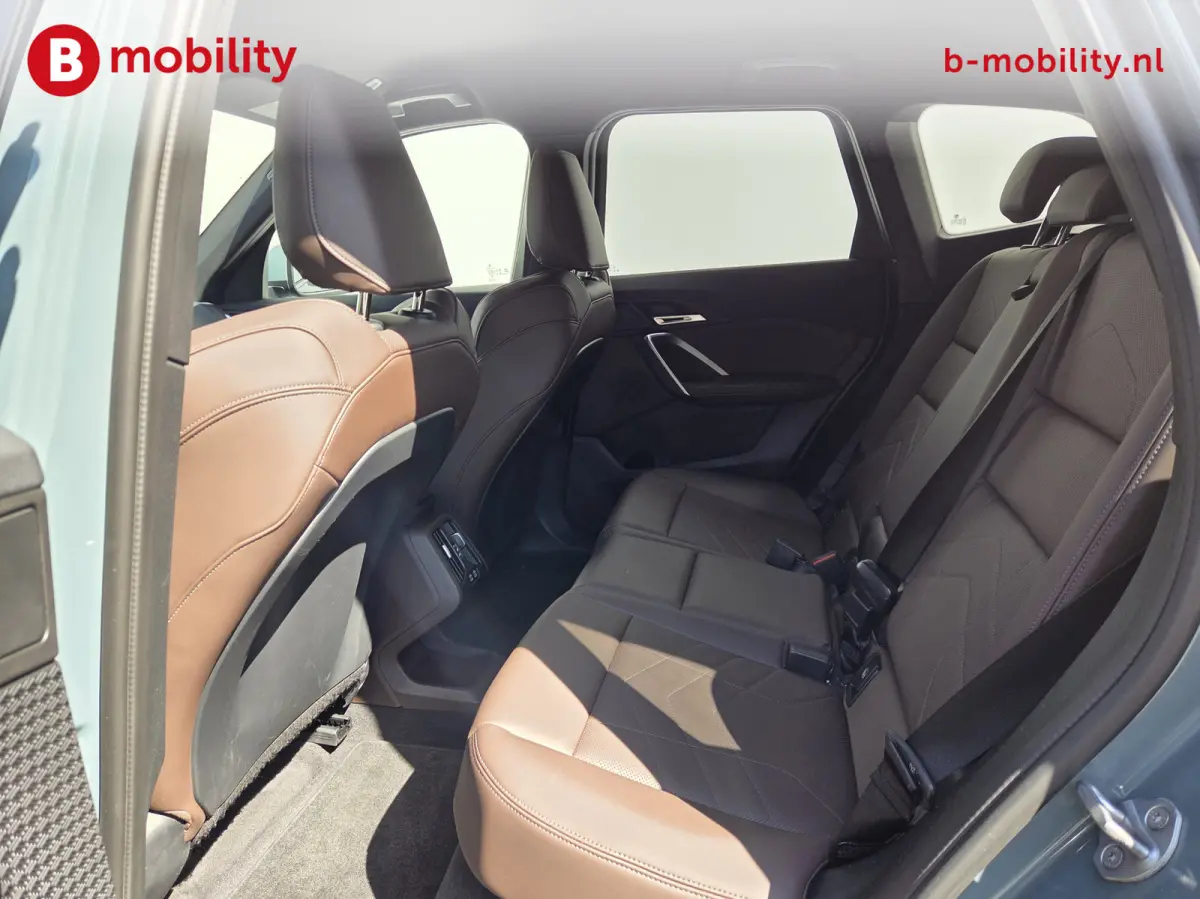 eDrive20 67 kWh M-Sport SOH 99% Driving Assist. Plus | Sportstoelen | Park Assist | Leer | Adaptive Cruise Control | DAB | NL Auto! | Achteruitrijcamera