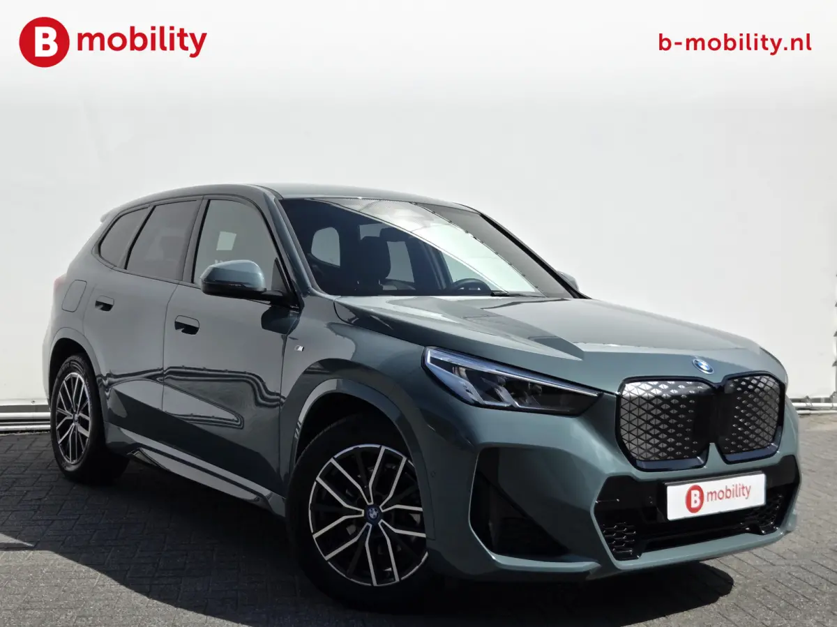 eDrive20 67 kWh M-Sport SOH 99% Driving Assist. Plus | Sportstoelen | Park Assist | Leer | Adaptive Cruise Control | DAB | NL Auto! | Achteruitrijcamera