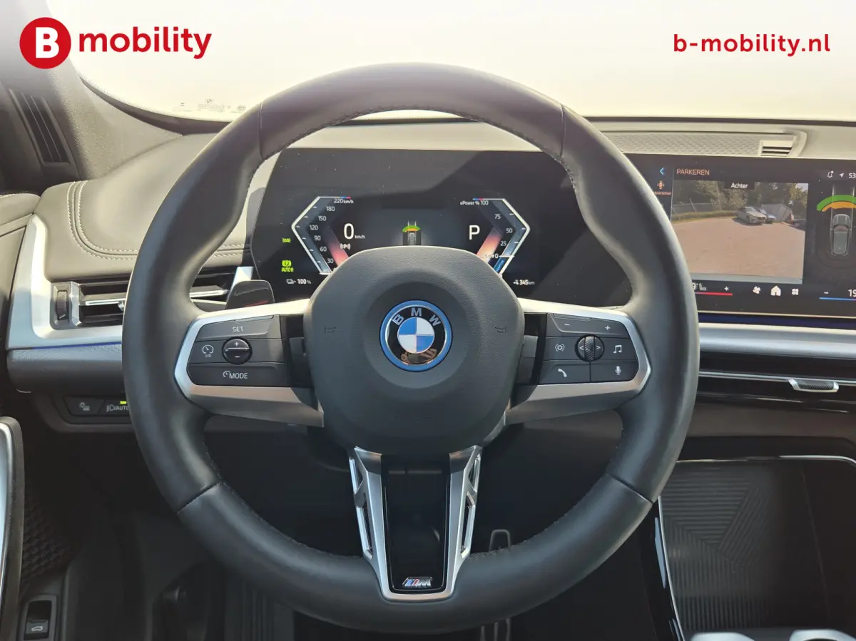 eDrive20 67 kWh M-Sport SOH 99% Driving Assist. Plus | Sportstoelen | Park Assist | Leer | Adaptive Cruise Control | DAB | NL Auto! | Achteruitrijcamera
