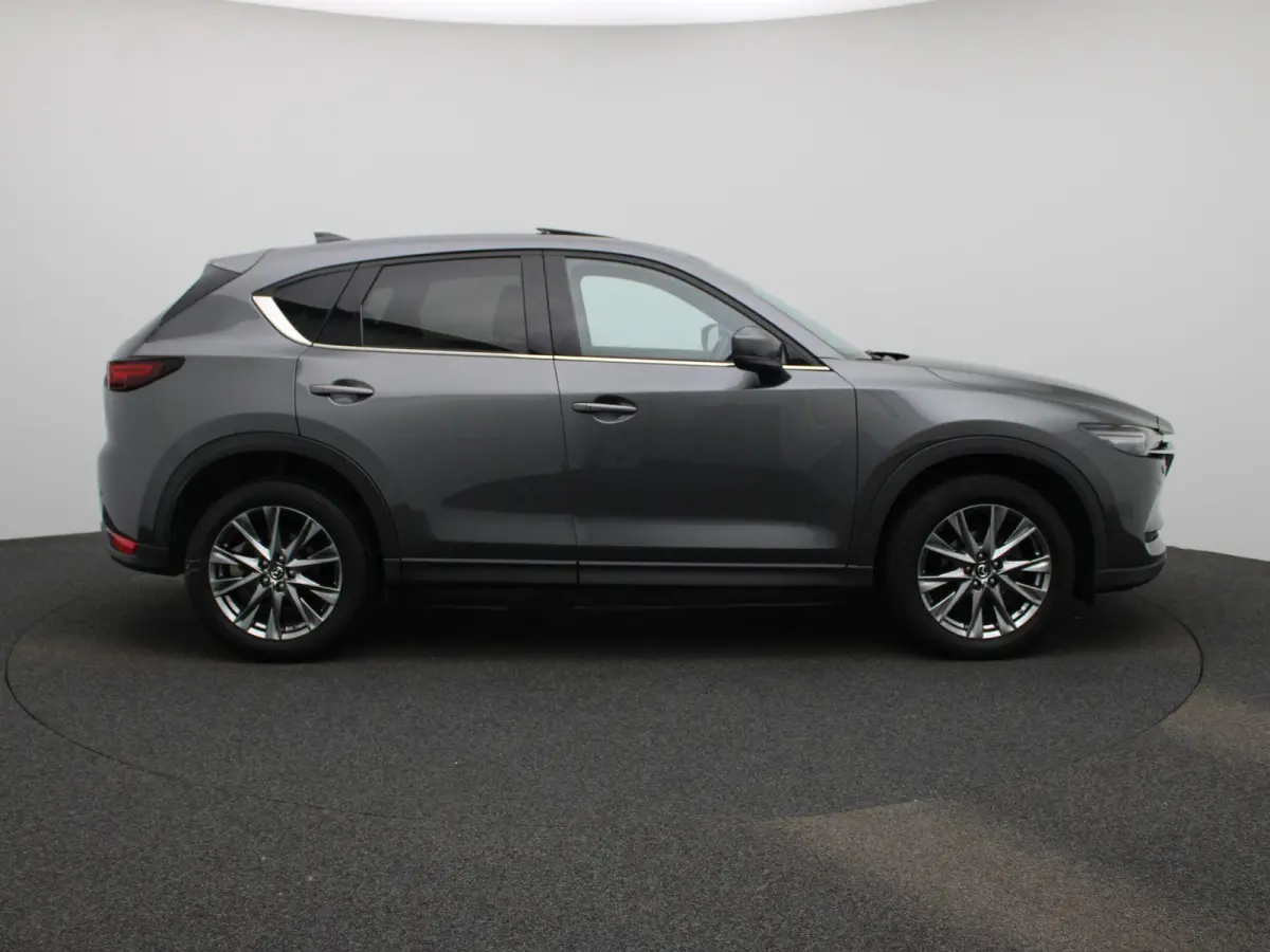 2.0 SkyActiv-G 165 Signature | SCHUIF-KANTELDAK | LEER | HEAD-UP | STOEL-STUURWIELVERWARMING | STOELVERKOELING | CAMERA | NAVIGATIE | BOSE AUDIO