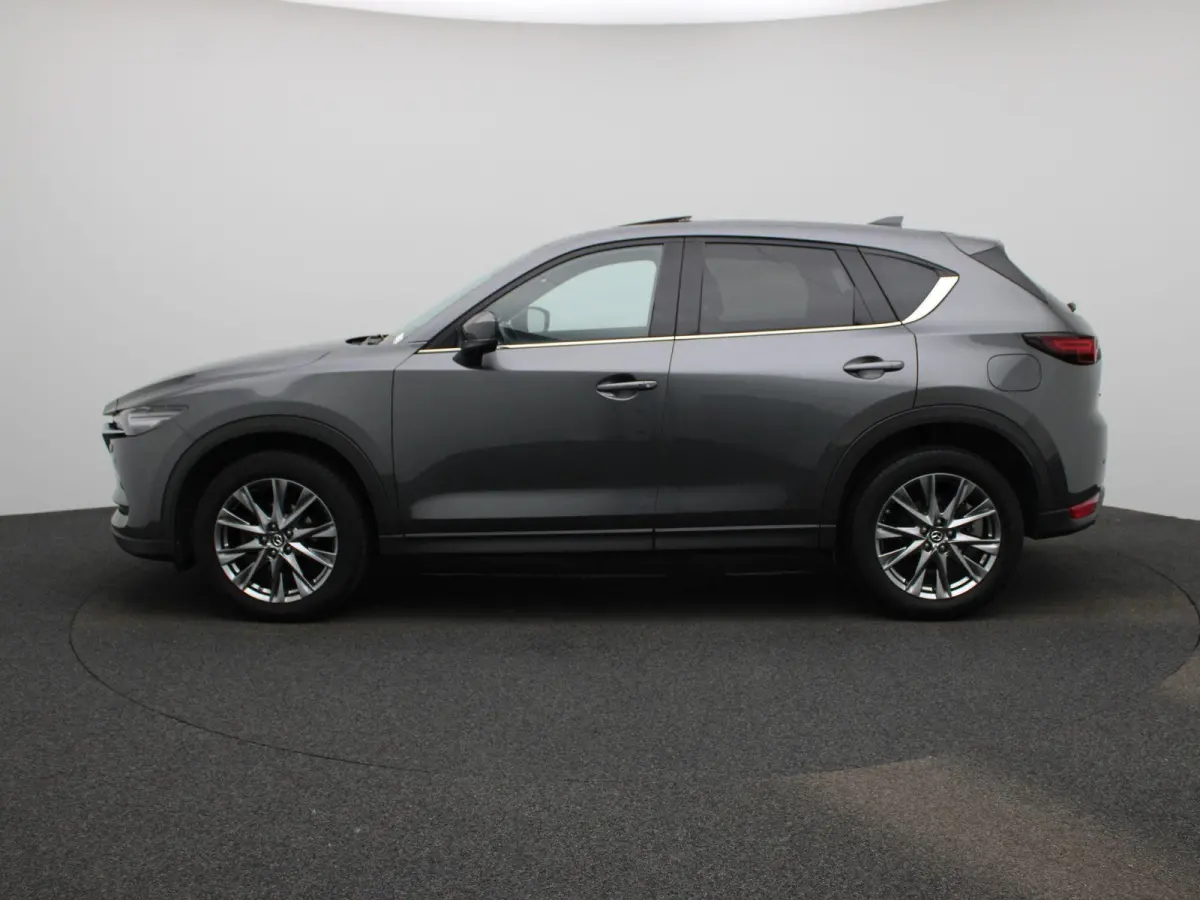 2.0 SkyActiv-G 165 Signature | SCHUIF-KANTELDAK | LEER | HEAD-UP | STOEL-STUURWIELVERWARMING | STOELVERKOELING | CAMERA | NAVIGATIE | BOSE AUDIO