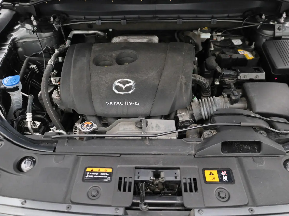 2.0 SkyActiv-G 165 Signature | SCHUIF-KANTELDAK | LEER | HEAD-UP | STOEL-STUURWIELVERWARMING | STOELVERKOELING | CAMERA | NAVIGATIE | BOSE AUDIO