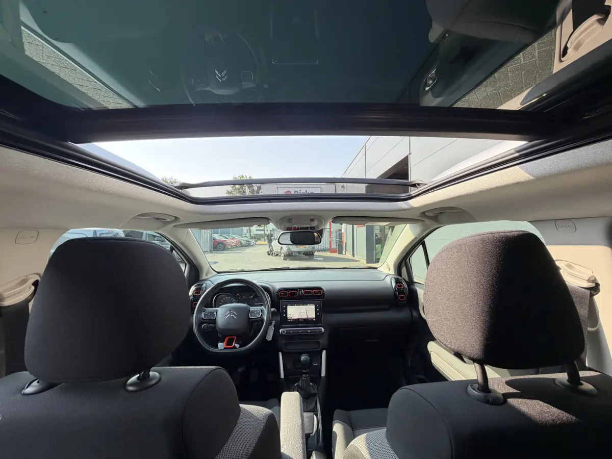 110pk Shine (Elektrisch Schuifdak - trekhaak - Camera - Parkeersensoren V+A - Automatische Airco - Navigatie - Apple carplay)