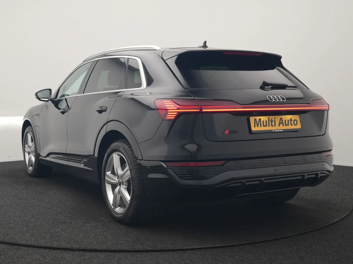 55 Quattro S Line 114 kWh 408pk Dealer O.H. | Trekhaak Afn. | Luchtvering | Adaptive Cruise | Head Up | Matrix LED | Camera | Alcantara Sportstoelen Verwarmd | Sfeerverlichting | Keyless | N