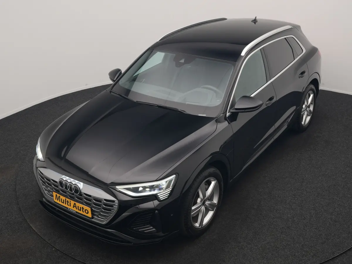 55 Quattro S Line 114 kWh 408pk Dealer O.H. | Trekhaak Afn. | Luchtvering | Adaptive Cruise | Head Up | Matrix LED | Camera | Alcantara Sportstoelen Verwarmd | Sfeerverlichting | Keyless | N