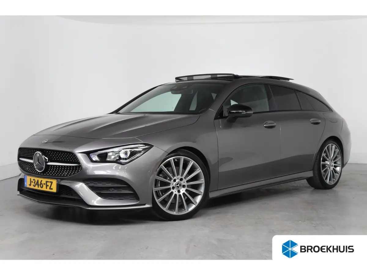 200 AMG | Open Dak | Sportstoelen | Sfeerverlichting | Camera | BLIS | Clima | LED | Navi | Widescreen | Keyless | Lichtmetale Velgen | Cruise Control