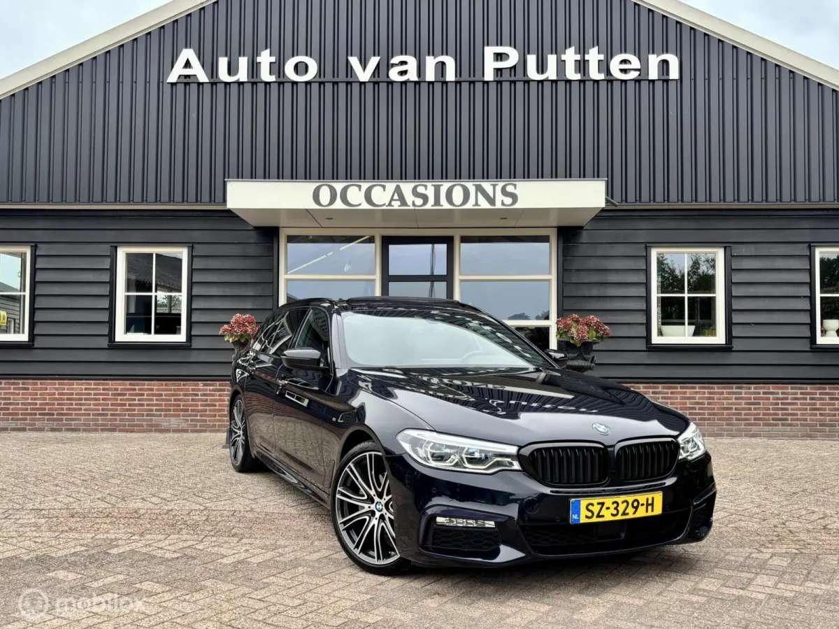 520i High Executive / M-Pakket / Pano / Head-up / Trekhaak /