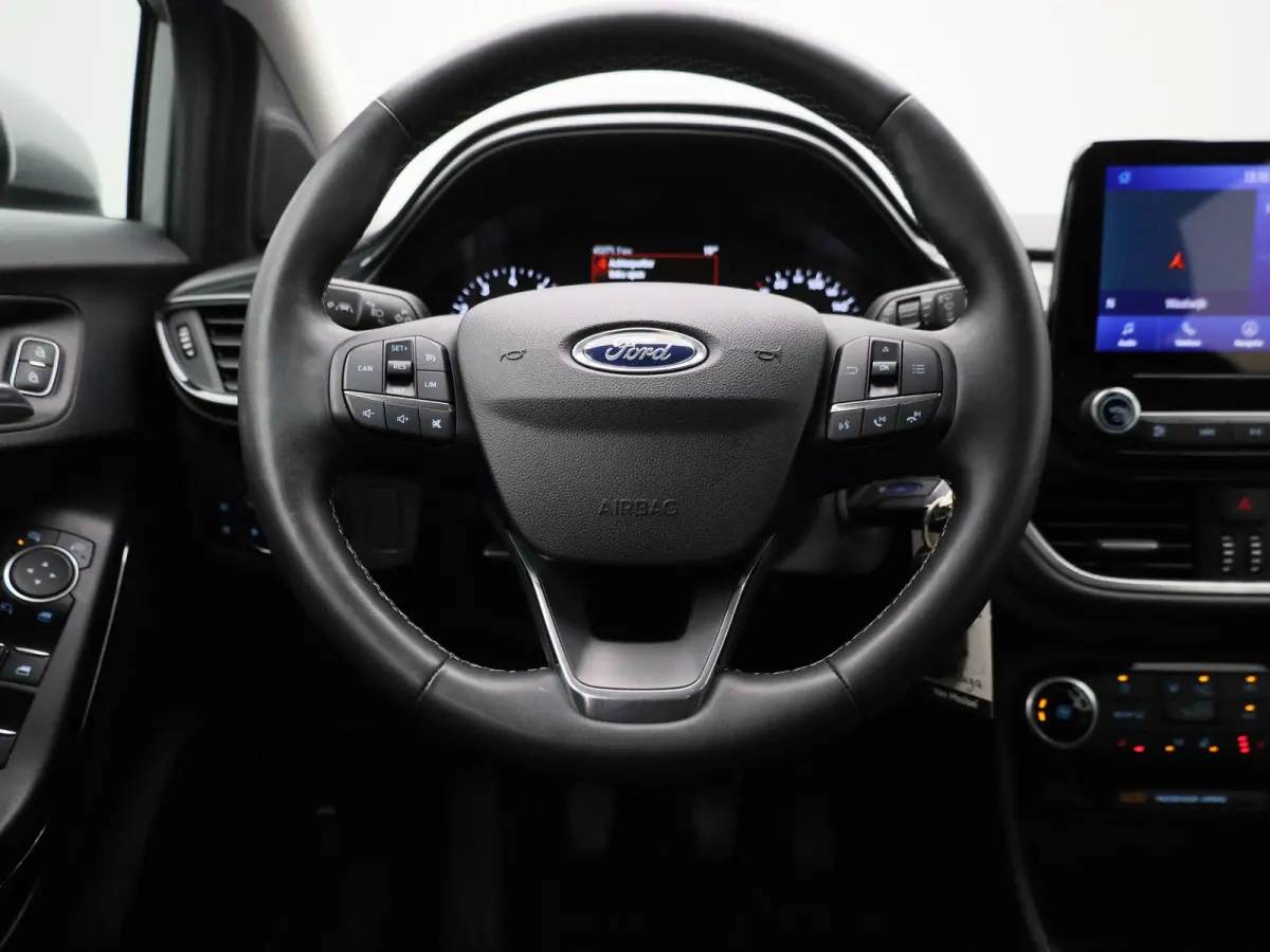 1.0 EcoBoost Titanium | Navigatie | Stoel/Stuur verwarming | Climate control | Bluetooth | DAB | Cruise Control | Airco | Parkeersensoren | Lichtmetalen Velgen |