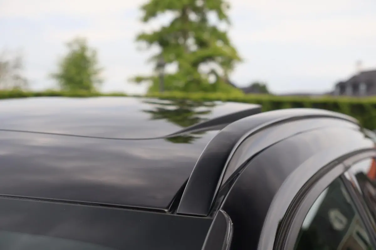 T4 R-Design | Stoelverwarming | Parkeercamera | Panoramadak | H/K | Glossy Black | Keyless