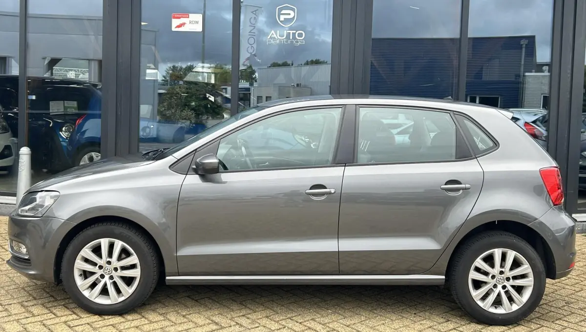 1.2 TSI Highline 90PK | Volledige Onderhoudshistorie | 5 Deurs | Parkeersensoren Voor en Achter | Airco | Cruise Control | Lichtmetalen Velgen | 2 Sleutels | Armsteun |
