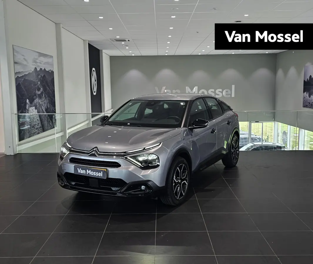 Feel 50 kWh Climate Control | Full Map Navigatie | Apple Carplay / Android Auto | Camera | Parkeersensoren | Bekleding Half Leder | 18" Lichtmetalen Velgen