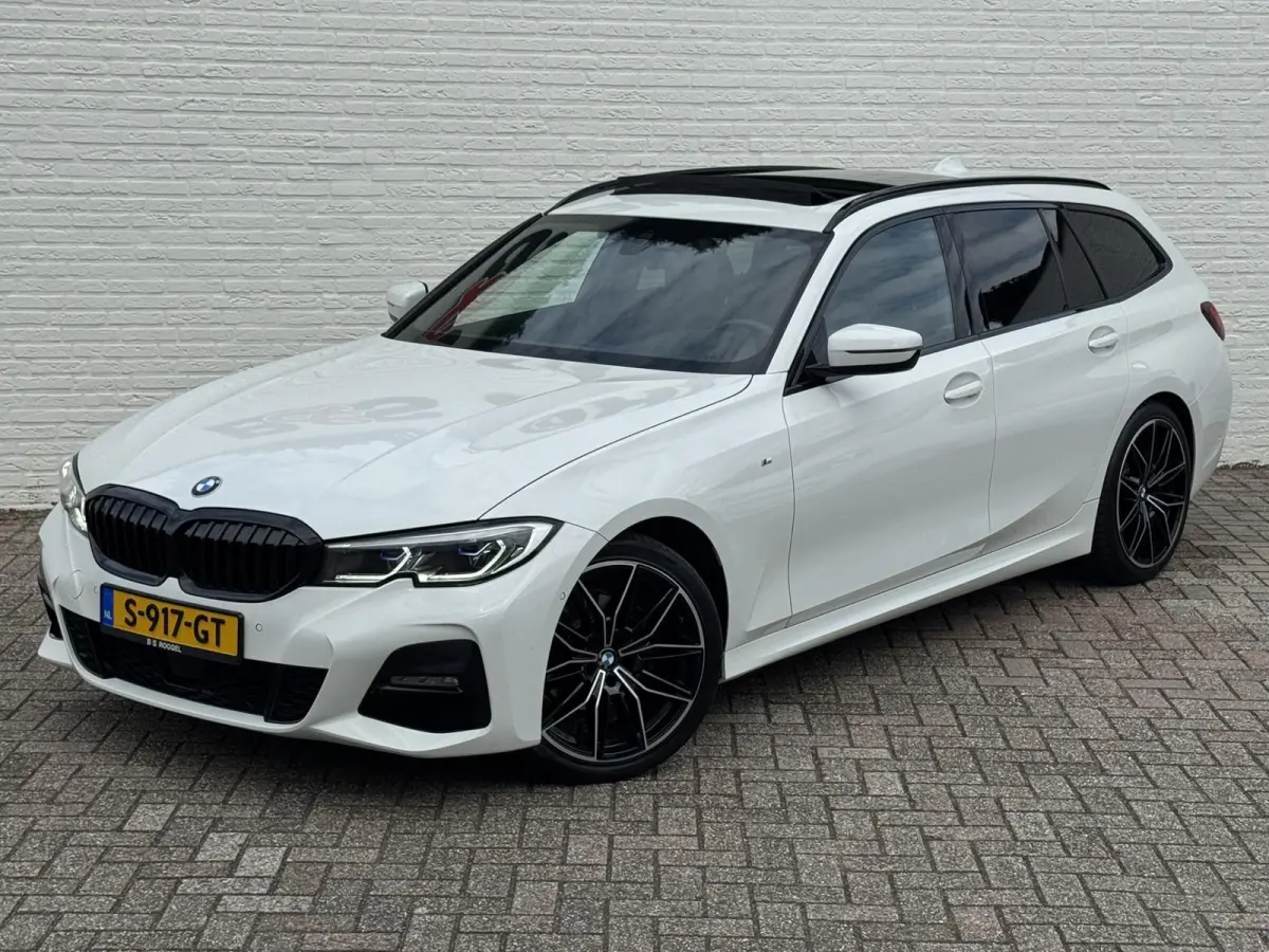 320i High Exec. M-Sport individual Sfeer Leder Camera Carplay Trekhaak Led