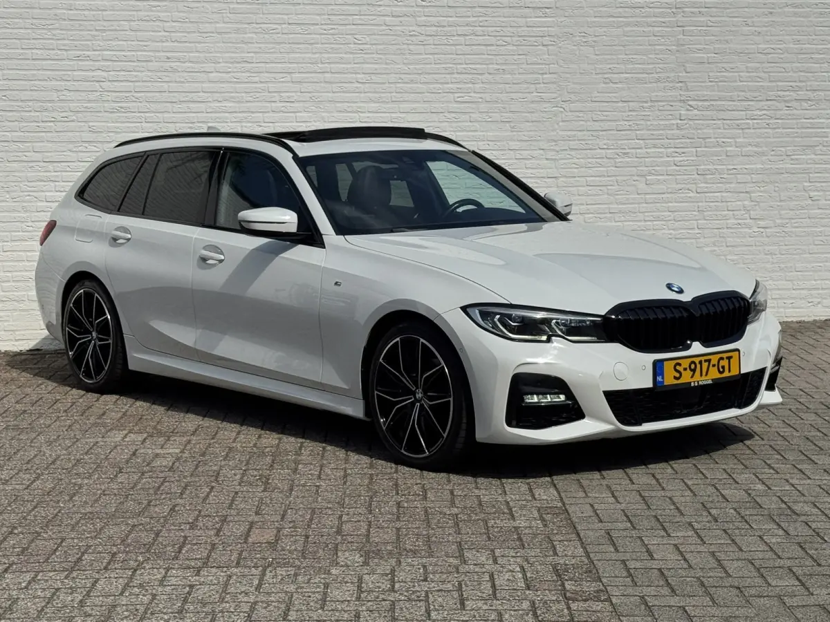 320i High Exec. M-Sport individual Sfeer Leder Camera Carplay Trekhaak Led
