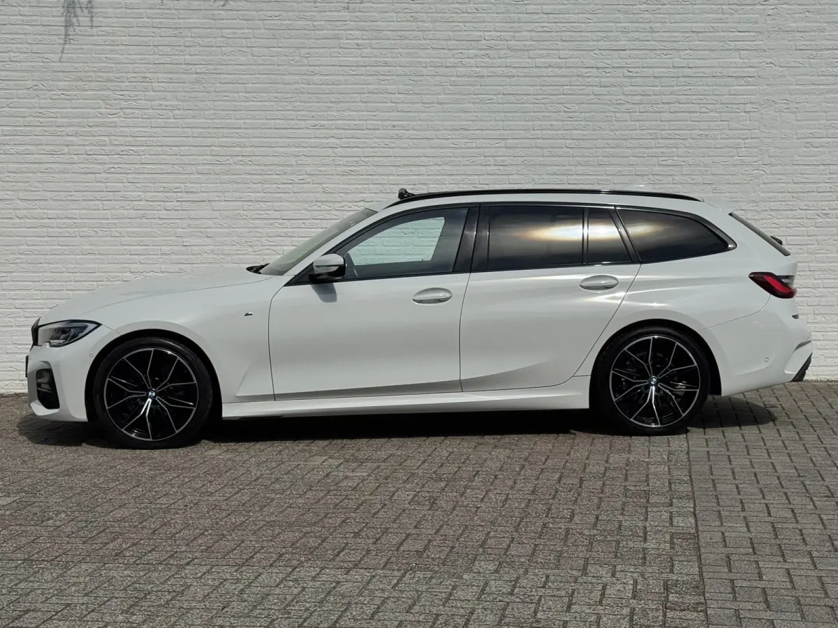 320i High Exec. M-Sport individual Sfeer Leder Camera Carplay Trekhaak Led