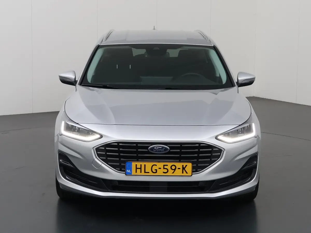 1.0 EcoBoost Hybrid Titanium | Winterpakket | Navigatie | Climate Control | Parkeersensoren | Cruise Control |