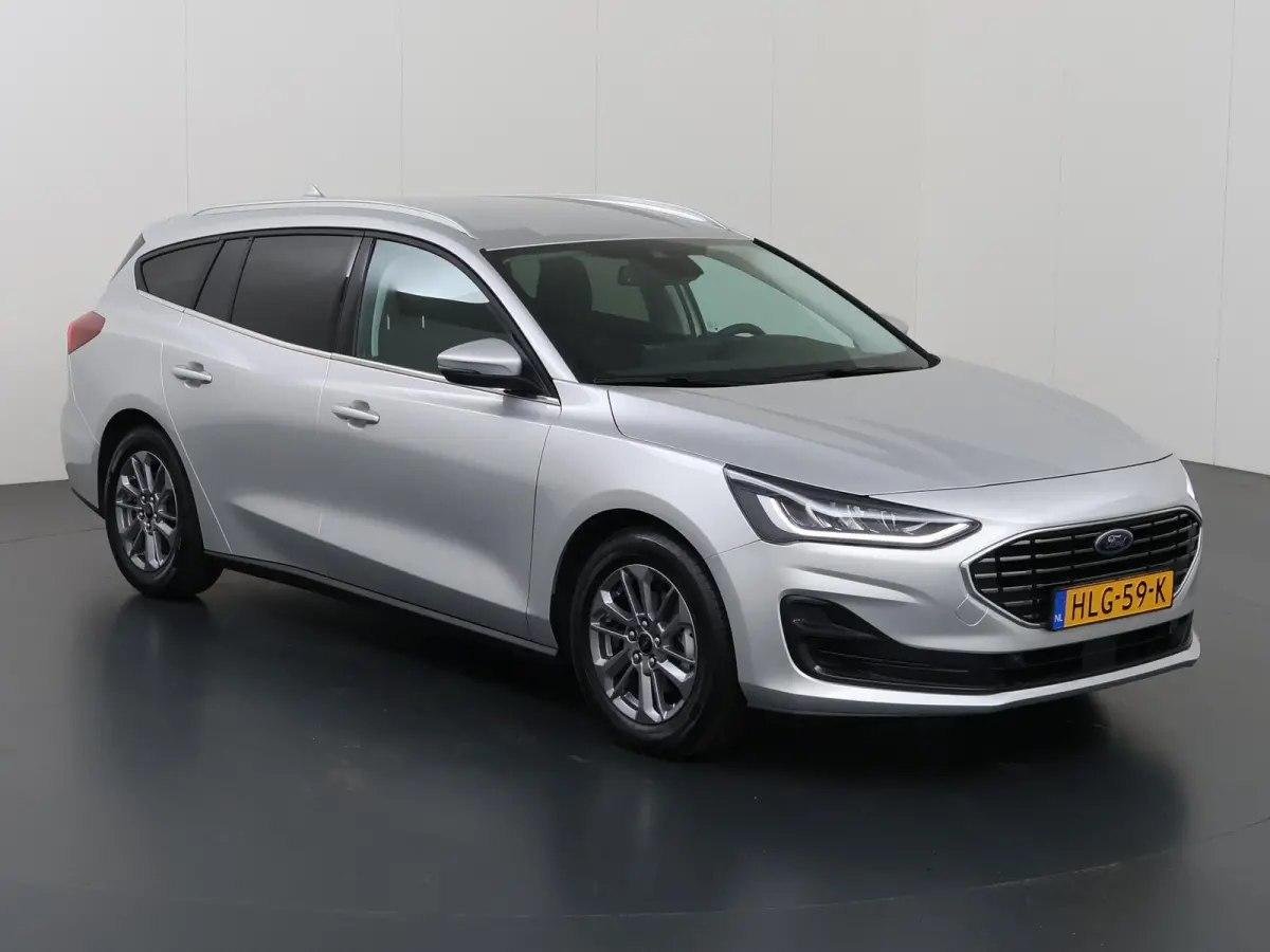 1.0 EcoBoost Hybrid Titanium | Winterpakket | Navigatie | Climate Control | Parkeersensoren | Cruise Control |