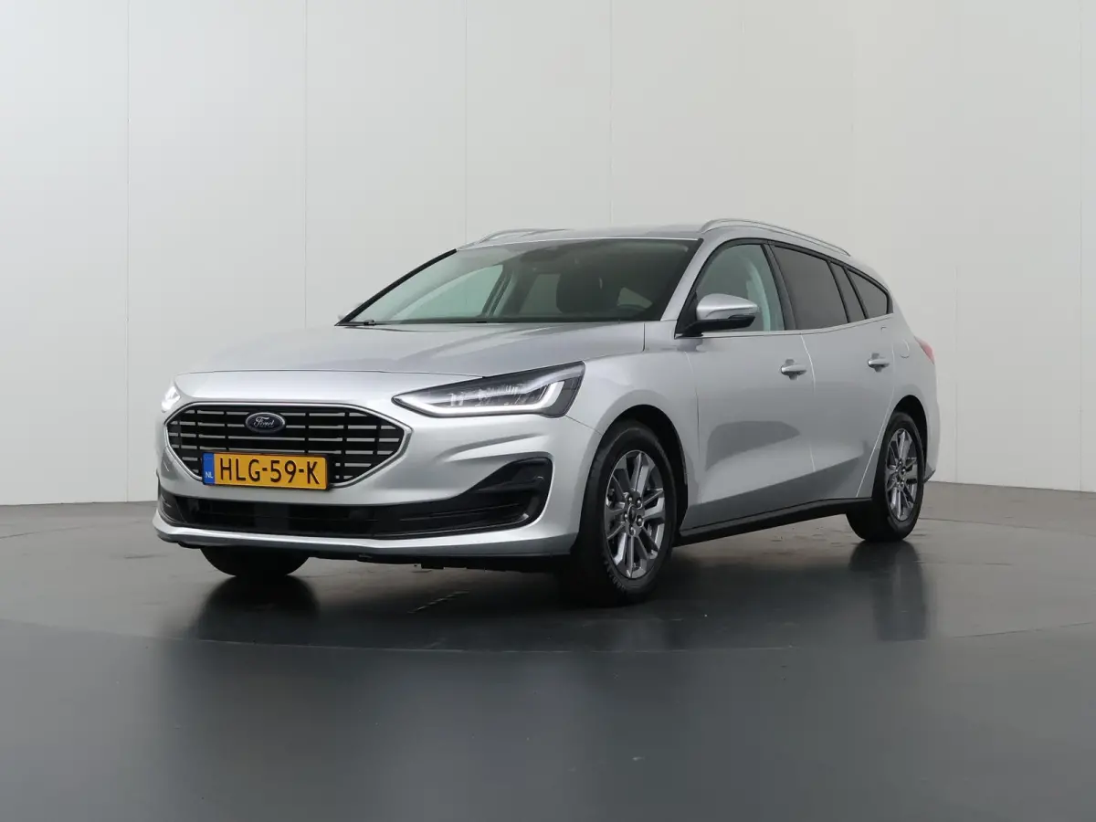1.0 EcoBoost Hybrid Titanium | Winterpakket | Navigatie | Climate Control | Parkeersensoren | Cruise Control |