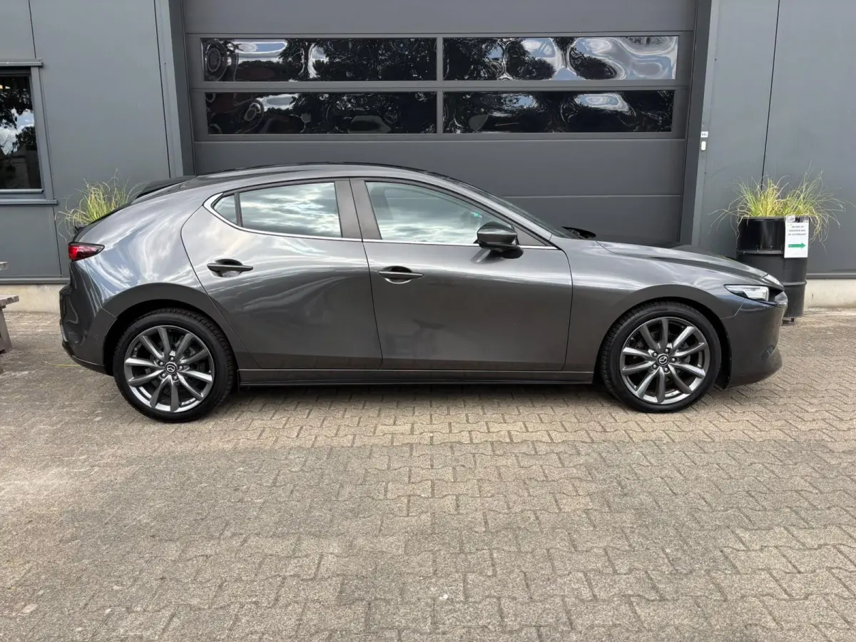 2.0 e-SkyActiv-G M Hybrid 122 Luxury | AppleCarPlay/ AndroidAuto | Stuurwielverwarming | Stoelverwarming | Lederen bekleding!!