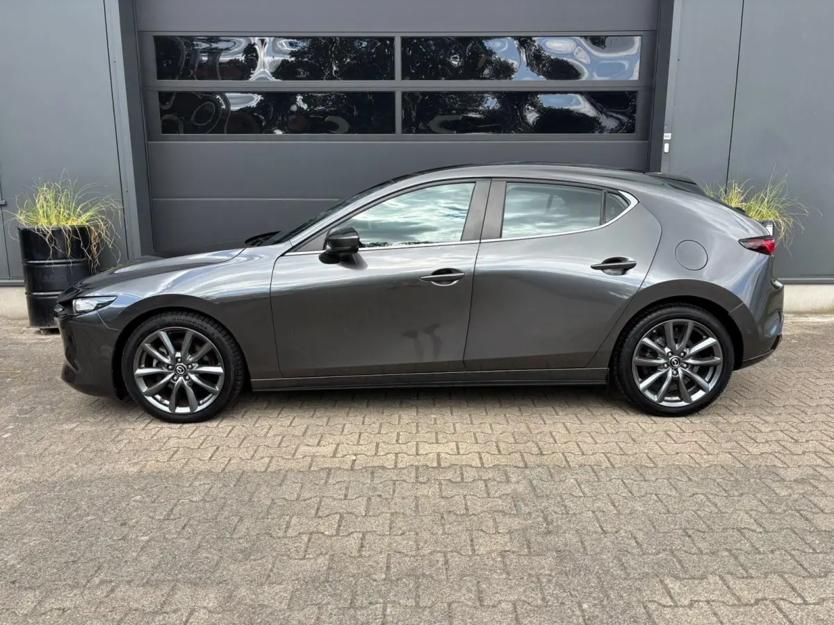 2.0 e-SkyActiv-G M Hybrid 122 Luxury | AppleCarPlay/ AndroidAuto | Stuurwielverwarming | Stoelverwarming | Lederen bekleding!!