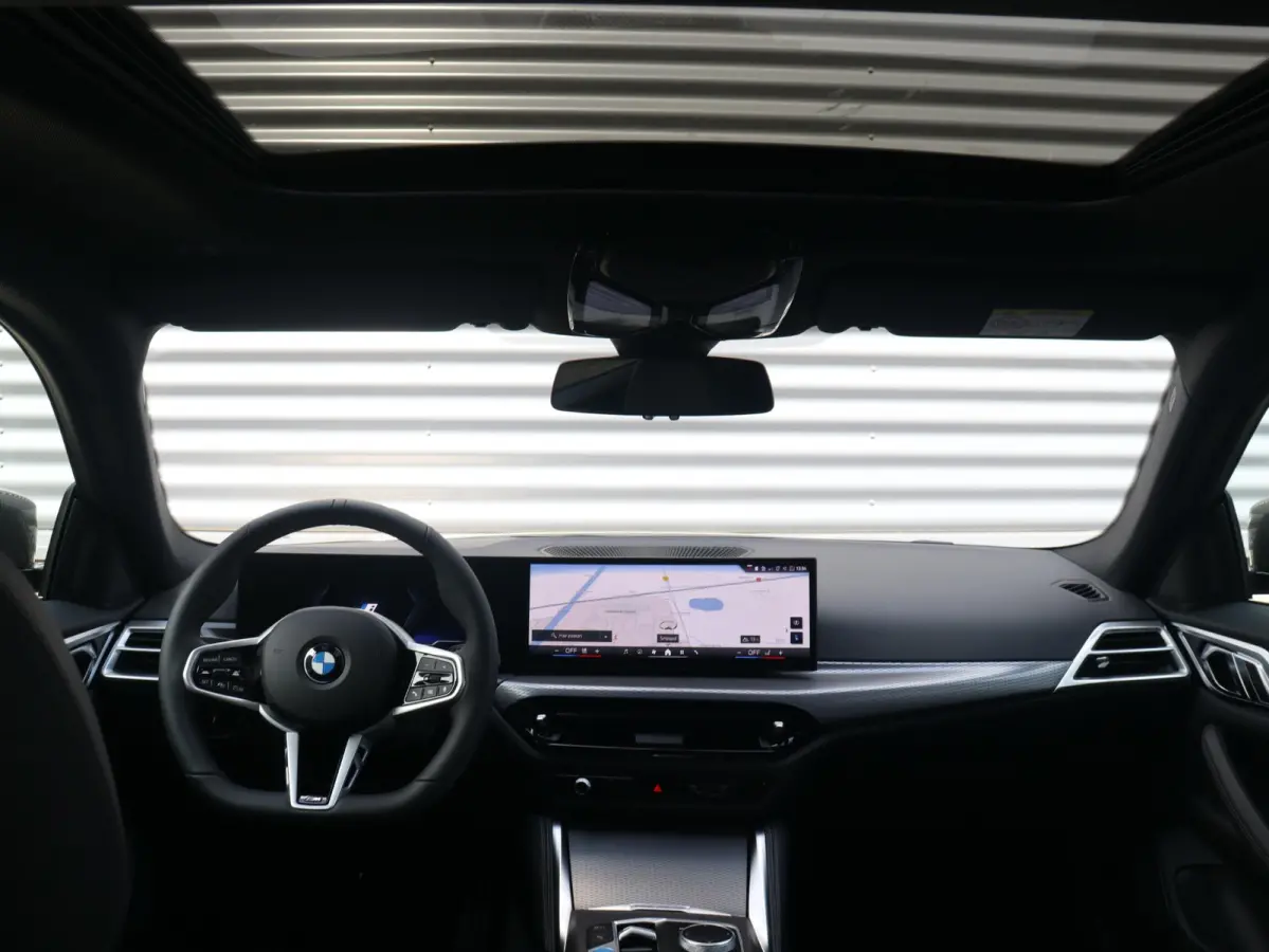 eDrive35 | M Sportpakket Pro | Panodak | Individual Lak | Laserlight | Hi-Fi | Camera | Adaptive Cruise Control | Comfort Access | Stuurwiel Verwarmd | SOH 100% | 19'' LMV