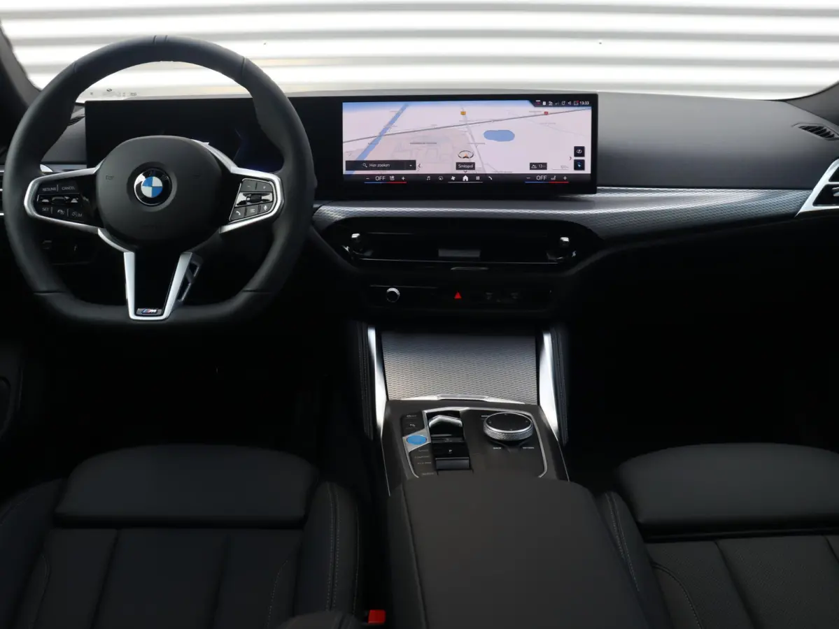 eDrive35 | M Sportpakket Pro | Panodak | Individual Lak | Laserlight | Hi-Fi | Camera | Adaptive Cruise Control | Comfort Access | Stuurwiel Verwarmd | SOH 100% | 19'' LMV