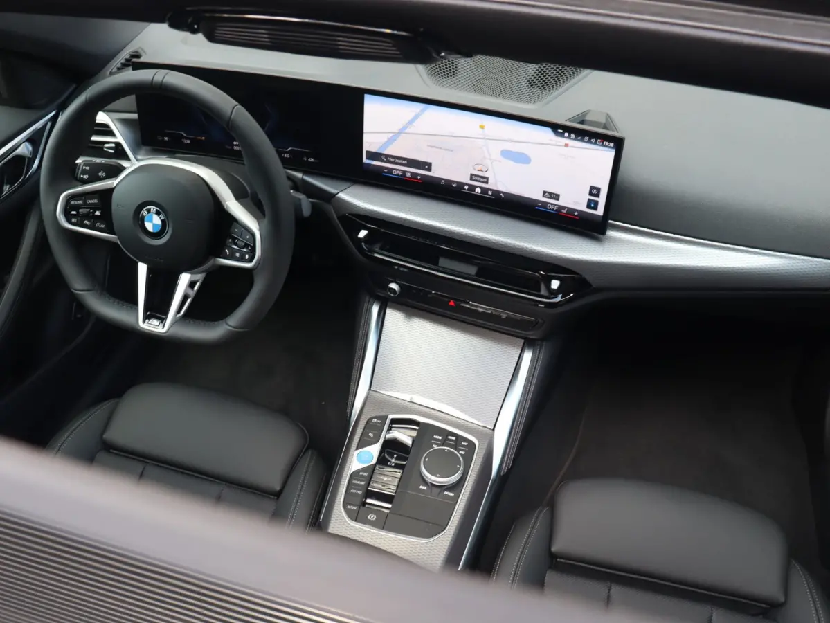 eDrive35 | M Sportpakket Pro | Panodak | Individual Lak | Laserlight | Hi-Fi | Camera | Adaptive Cruise Control | Comfort Access | Stuurwiel Verwarmd | SOH 100% | 19'' LMV