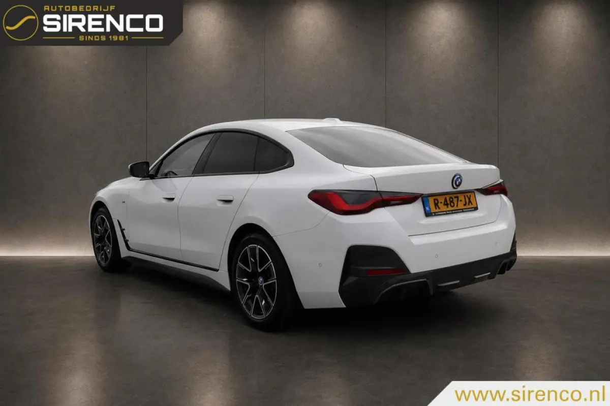 eDrive40 High Executive 84 kWh | M pakket | virtual widescreen cockpit | adaptieve cruise control | led | camera |