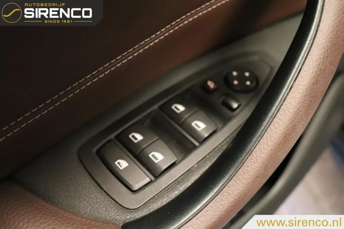 sDrive18i High Executive | leder sportzetels| stoelverwarming | hud | climate & cruise control | navigatie & bluetooth
