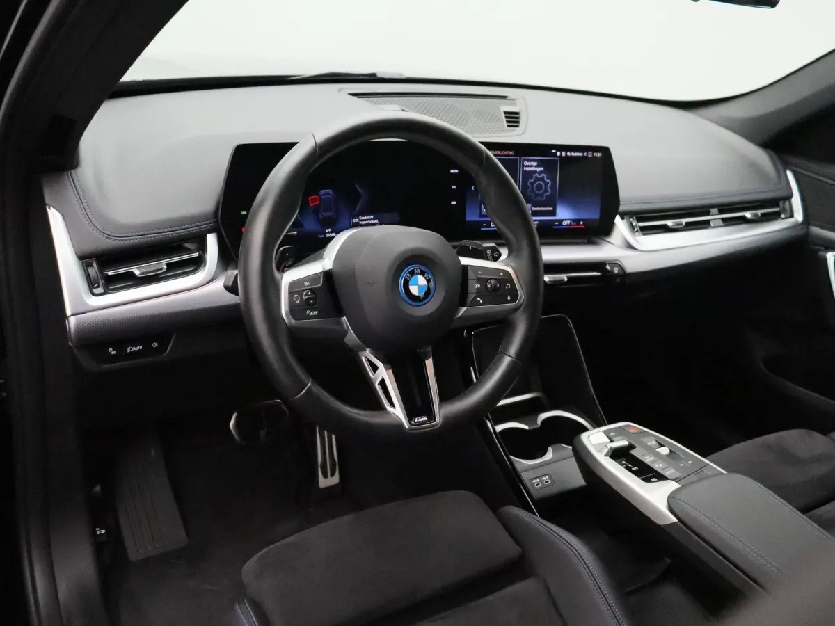 xDrive25e M Sportpakket | Premium Pack | SoH 100% | Comfort Access | Parking Assistant | 18''
