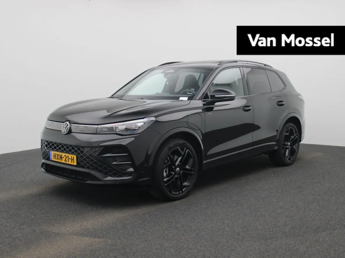 1.5 eHybrid R-Line Edition 204 PK| Origineel Nederlands | 1e Eigenaar | Panoramdak | Navigatie | Achteruitrijcamera | Achterklep Elektrisch | Stoelverwarming | Stuurwielverwarming