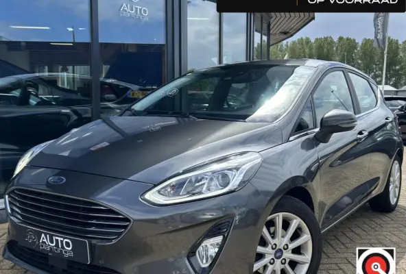 1.0 EcoBoost Titanium 101PK | 1e Eigenaar! | Dealeronderhouden | NL AUTO | AUTOMAAT | Trekhaak | Achteruitrijcamera | B&O Audio | Navigatie | Climate Control | Adaptive Cruise Control | Voor