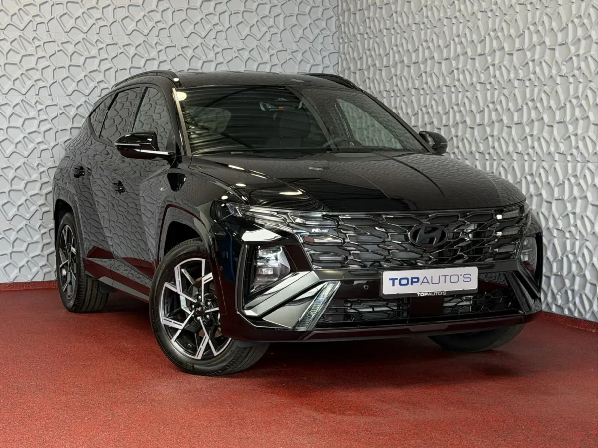 1.6 T-GDI PHEV LUXE N-LINE NIEUWE AUTO 360° CAMERA ELEK.KLEP ELEK.STOEL MET GEHEUGEN VERWARMD SUBWOOFER 19" LMV ZWARTE HEMEL STUURVERW. PLUG IN HYBRIDE