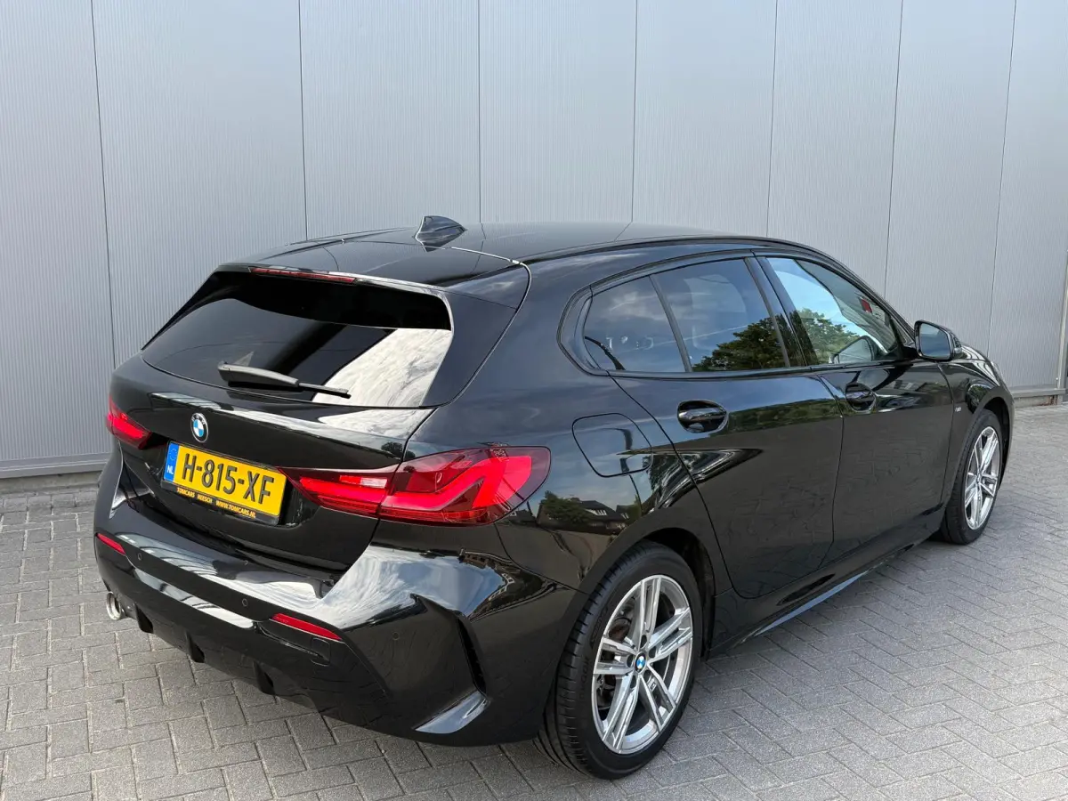 118i 140PK Automaat Executive Edition M-Sport Sportstoelen/Parkeerhulp/Navigatie/Cruise-control