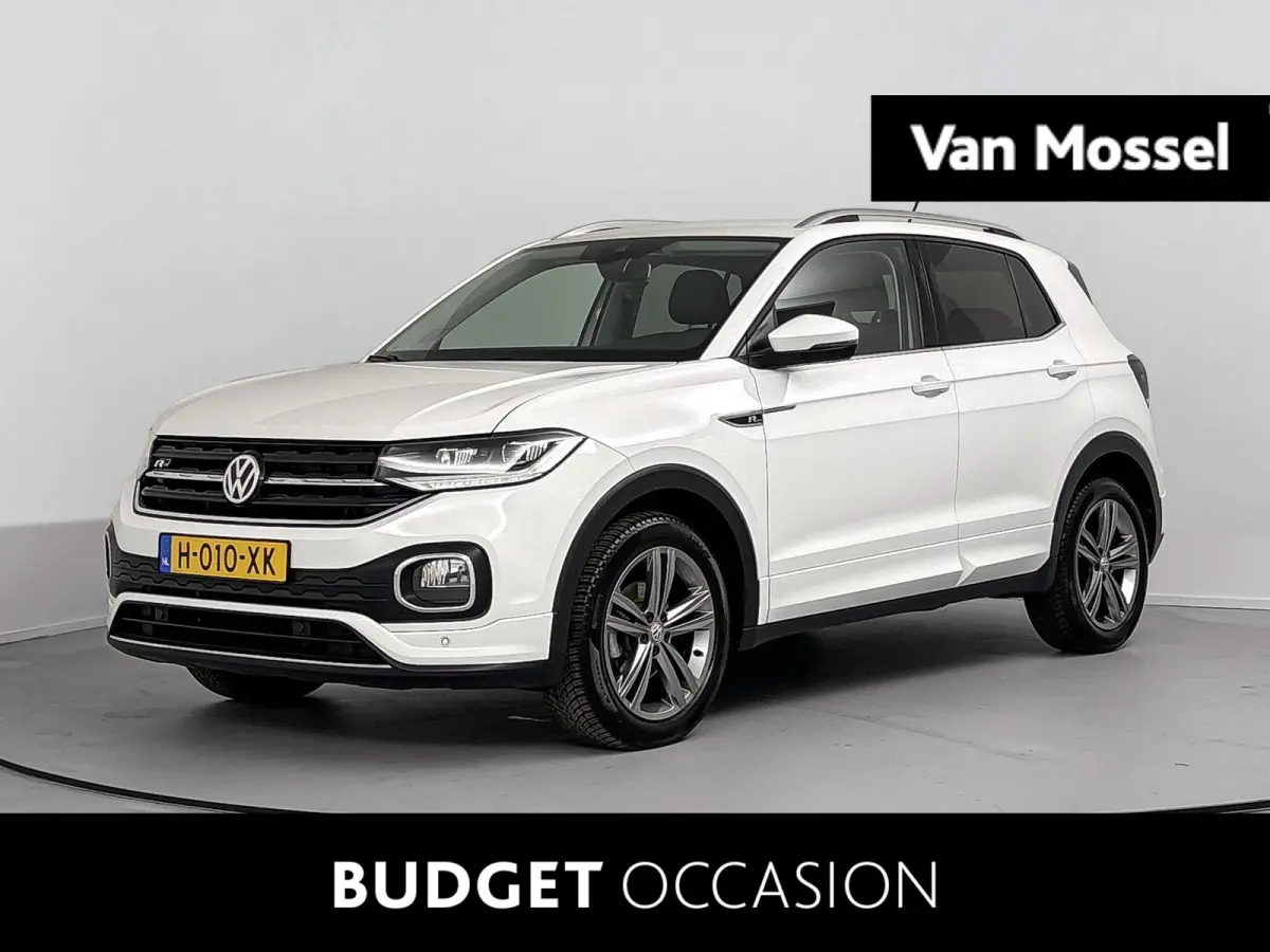 1.0 TSI Style Airco | Cruise Control | Dakrails |  Lederen Stuurwiel | Lichtmetalen Velgen | Parkeersensor Voor en Achter | Stuurwiel Multifunctioneel | Bluetooth | Navigatiesysteem | R-Line