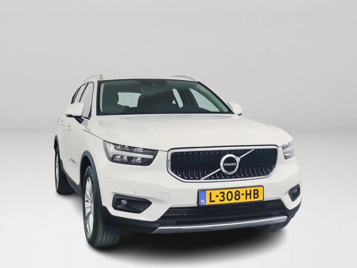 T2 Momentum | Park assist | Cruise control | Climate control | Navigatie