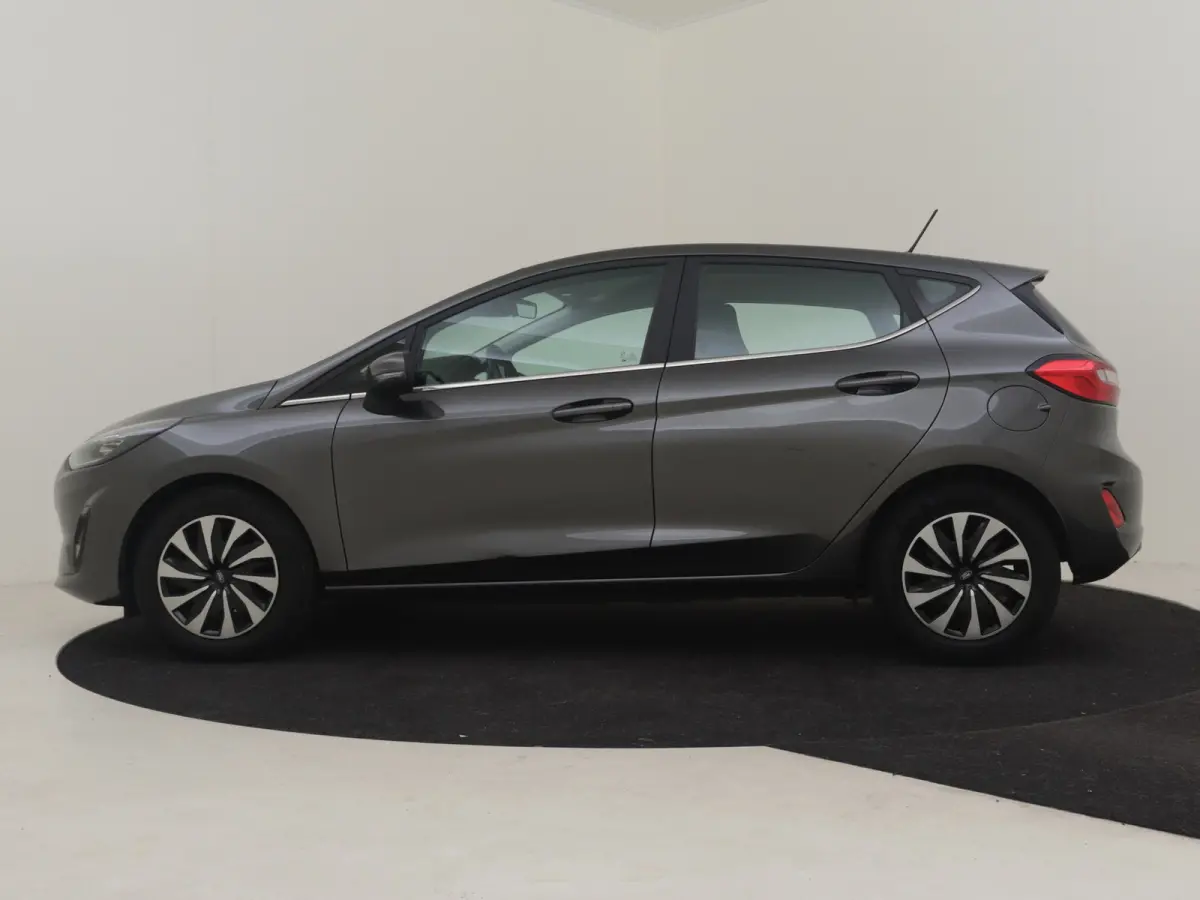 1.0 EcoBoost Hybrid Titanium l Cr Control l Climate Control l Stoel/stuurverwarming | Parkeersensoren l Naviagtie l Apple Car play l Metallic lak l