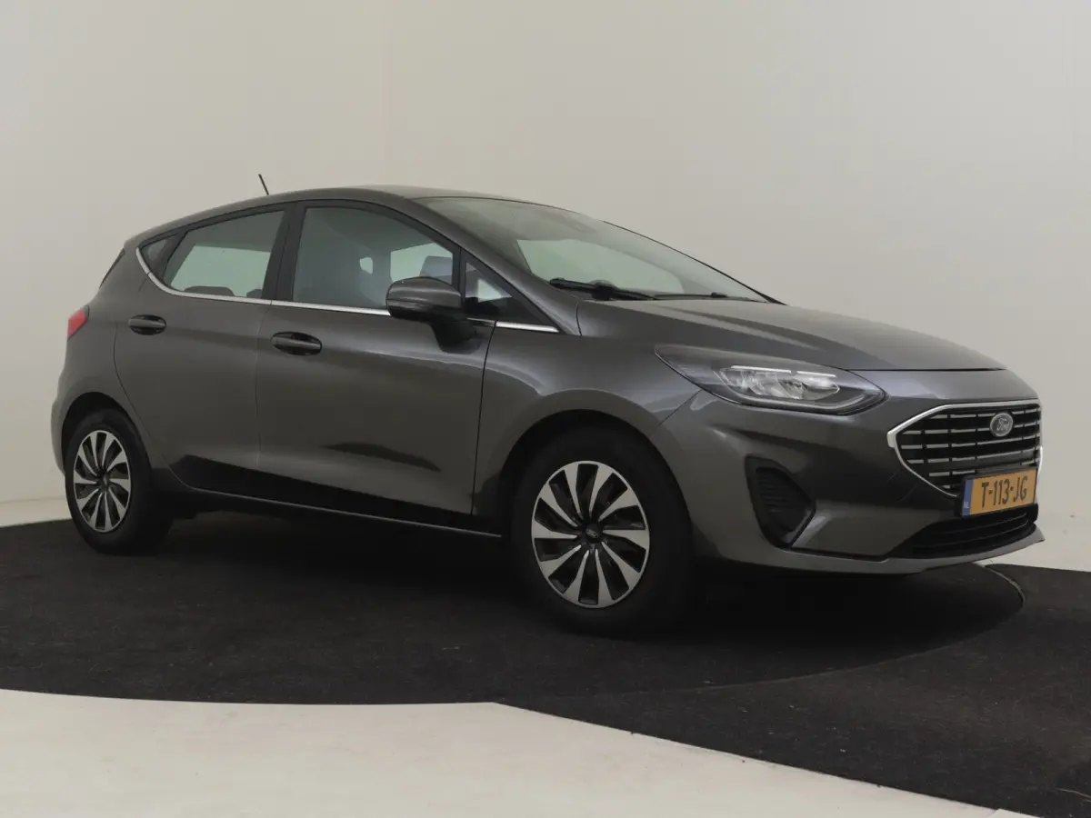 1.0 EcoBoost Hybrid Titanium l Cr Control l Climate Control l Stoel/stuurverwarming | Parkeersensoren l Naviagtie l Apple Car play l Metallic lak l