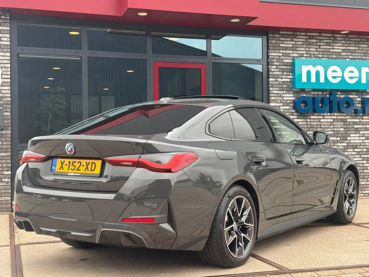 40 84 kWh High Executive M-SPORT l SOH 96,4% l H/K l HUD l 360 l SCHUIFDAK l DRAVITGRAU l SFEER l ORG.NL l 1e EIG l