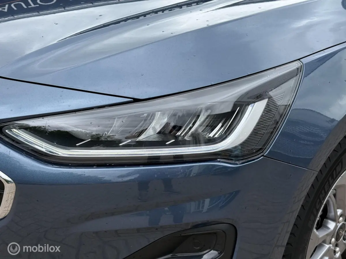 1.0 EcoBoost Hybrid Titanium | Clima | PDC V+A | Navi | Privacy Glas | Cruise | Led |