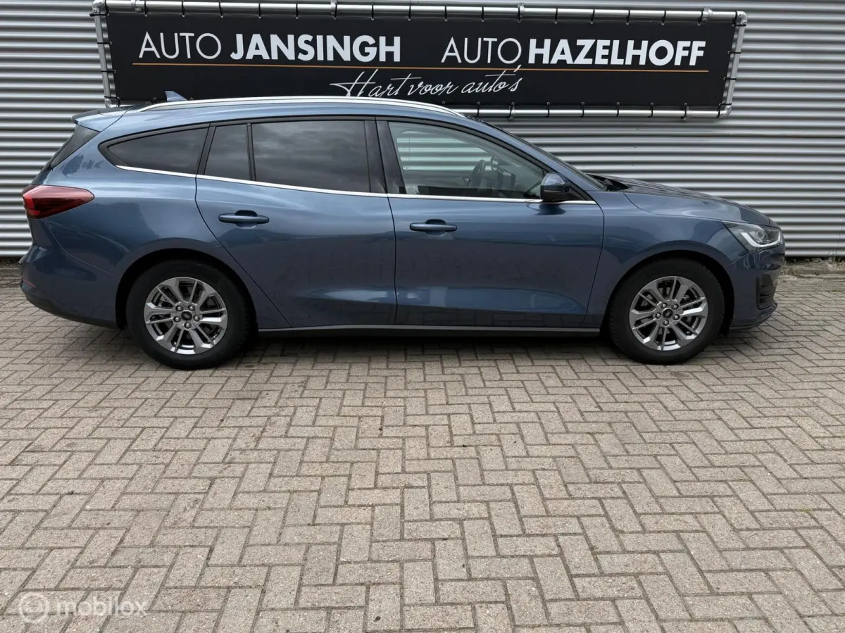 1.0 EcoBoost Hybrid Titanium | Clima | PDC V+A | Navi | Privacy Glas | Cruise | Led |